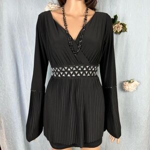 kaily. k womens flowy pleated babydoll flared sleeve v neck top.